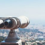 tourist binoculars at a viewing point over Barcelona