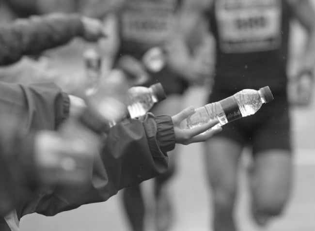 Water bottles offered to runners