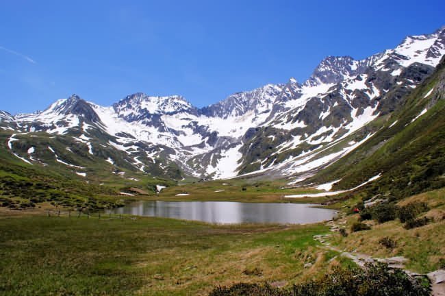 lake at the foot of mountains, South Tyrol