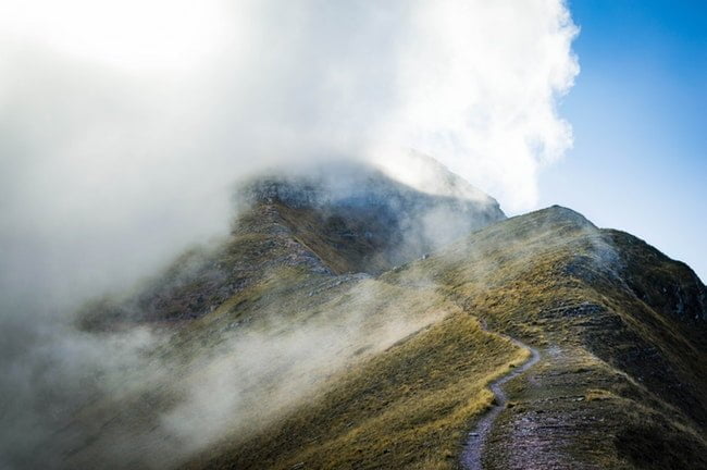 Misty path up a mountain