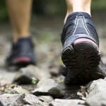 feet of a hill-walker on rocky ground