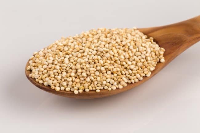 small spoonful of quinoa grains