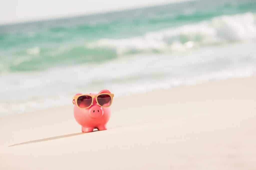piggy bank on the beach