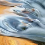 close-up of light on flowing water