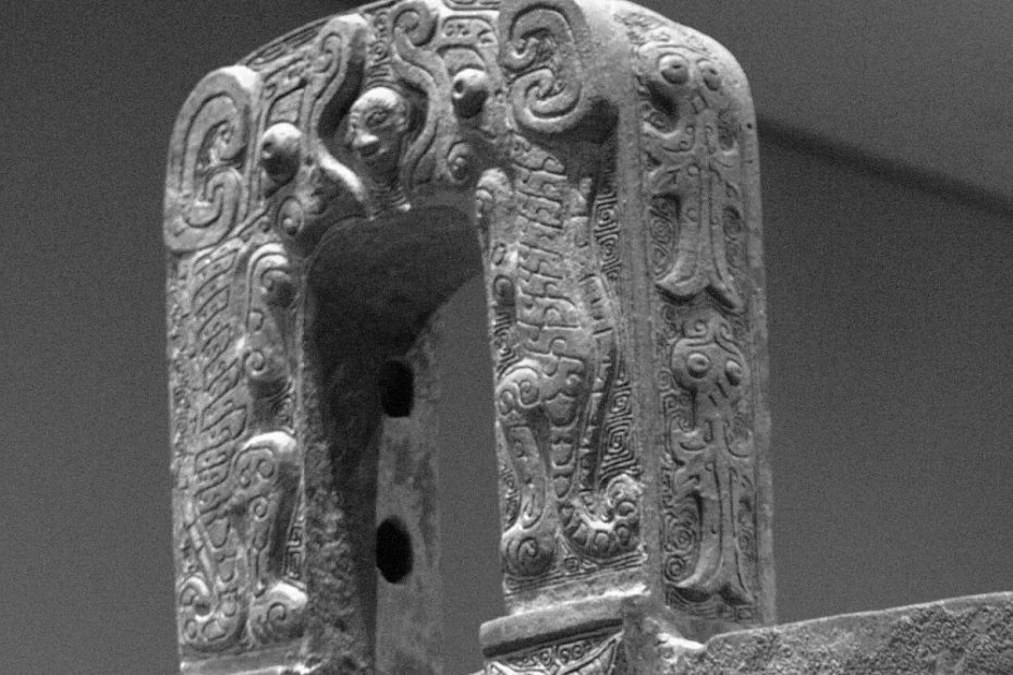 Detail of the Hou Mu Wu Ding vessel handle showing human face in tigers' jaws